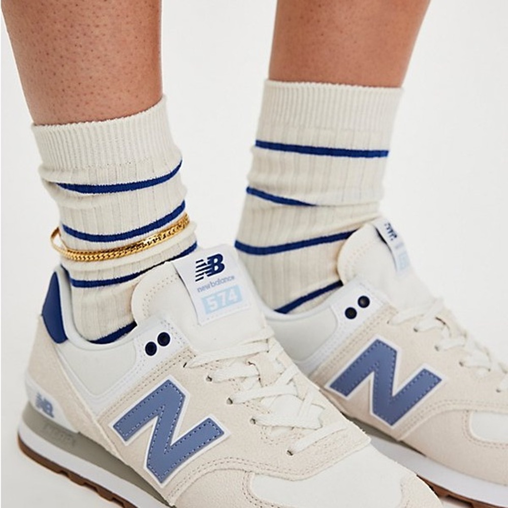 New Balance Men's Cream Sneakers with Blue Accents